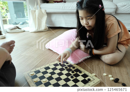 Playing Draughts Game 125465671