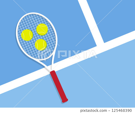 Tennis racket with balls lying on a blue court 125468390