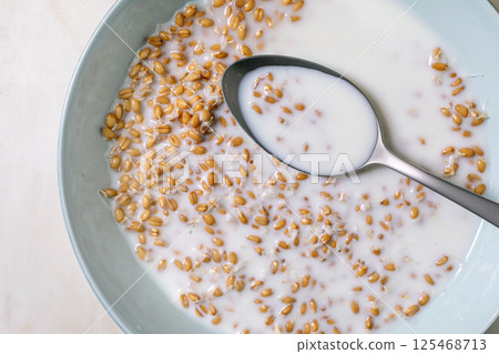 sprouted wheat Porridge With Metal Spoon 125468713