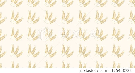 Ripe ears of grain on light beige background Ripe ears of grain on light beige background 125468725