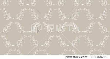 White silhouette of leaves on beige background 125468730