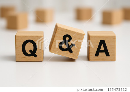 A composition of wooden blocks representing Q&A A composition of wooden blocks representing Q&A 125473512