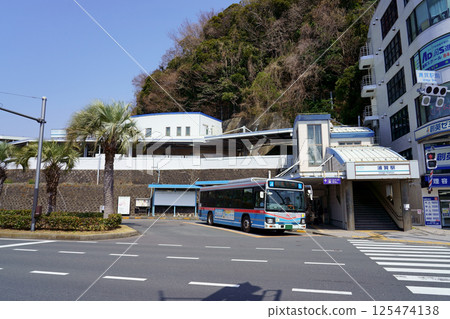 Keikyu Uraga Station on a clear day and the Keikyu bus bound for Kannonzaki Keikyu Uraga Station on a clear day and the Keikyu bus bound for Kannonzaki 125474138