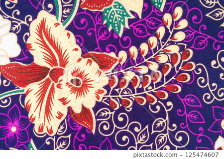 Charm of batik with various patterns and colors with floral motifs. 125474607