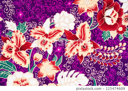 Charm of batik with various patterns and colors with floral motifs. 125474609