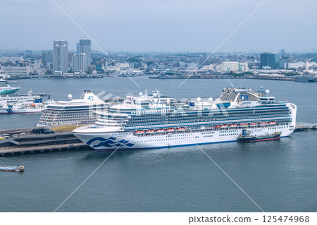 Yokohama cityscape in Japan with three luxury cruise ships: Norwegian Spirit, Riviera, and Diamond Princess Yokohama cityscape in Japan with three luxury cruise ships: Norwegian Spirit, Riviera, and Diamond Princess 125474968