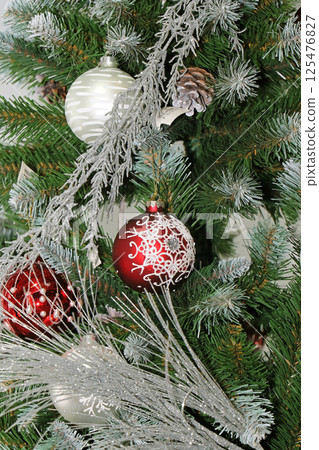 Festive Christmas tree  ornaments 125476827