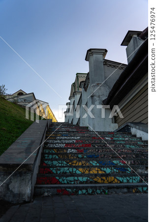 Mosaic steps, bottom-up view, old town. Evening City sunset 125476974