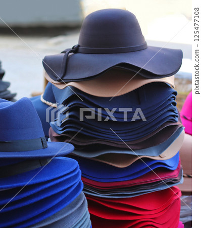 Pile of autumn wool hats 125477108