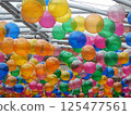 A background ceiling of colorful balloons 125477561