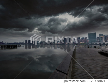 Manhattan New York cloudy dramatic skyline USA 125478071