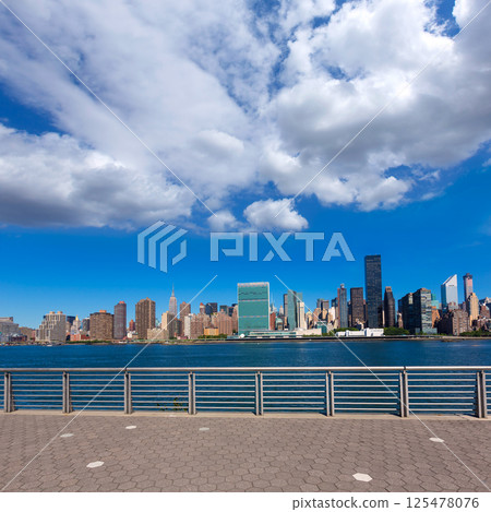 Manhattan New York sunny skyline East River NYC 125478076