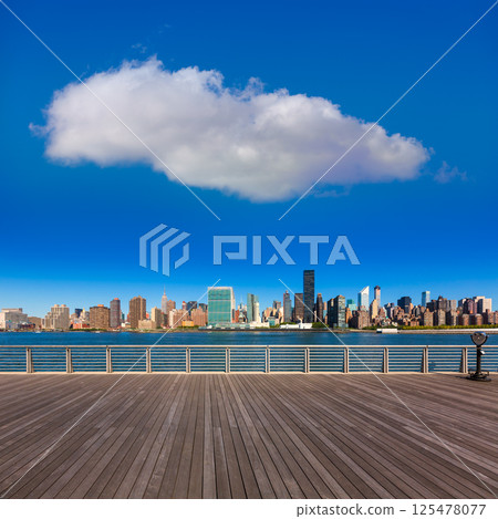Manhattan New York sunny skyline East River NYC Manhattan New York sunny skyline East River NYC 125478077