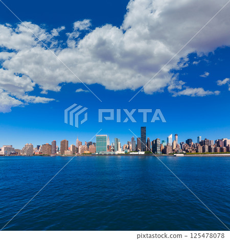 Manhattan New York sunny skyline East River NYC 125478078