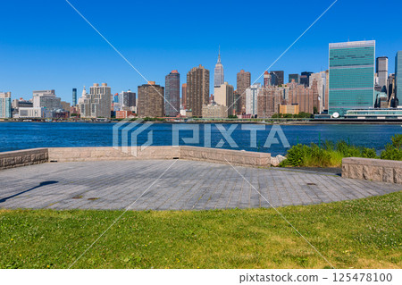 Manhattan New York sunny skyline East River NYC Manhattan New York sunny skyline East River NYC 125478100