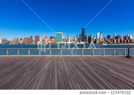 Manhattan New York sunny skyline East River NYC Manhattan New York sunny skyline East River NYC 125478102