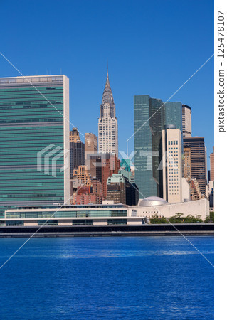 Manhattan New York sunny skyline East River NYC 125478107