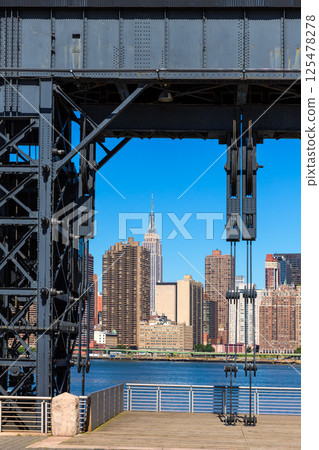 Manhattan New York skyline sunny from East 125478278