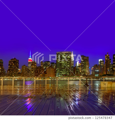 Manhattan New York sunset skyline from East 125478347