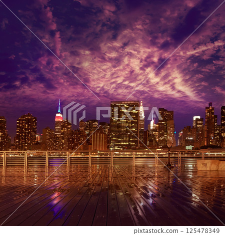 Manhattan New York sunset skyline from East 125478349