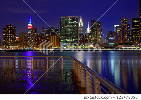 Manhattan New York sunset skyline from East 125478356