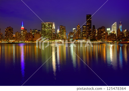 Manhattan New York sunset skyline from East 125478364