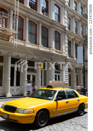 New York Soho buildings yellow cab taxi NYC USA 125478606