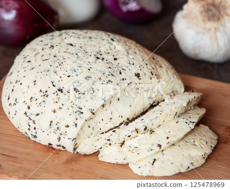 Homemade Organic Cheese with with herbs basil 125478969