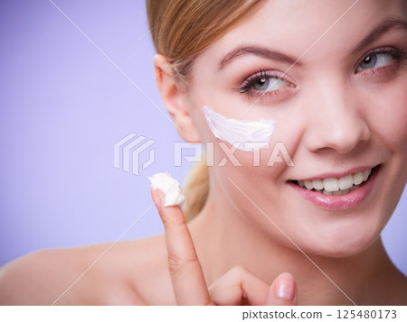 Skincare. Face of young woman girl taking care of dry skin. Skincare. Face of young woman girl taking care of dry skin. 125480173