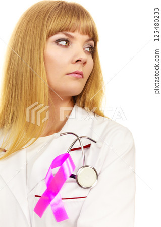 Woman doctor with pink ribbon aids symbol 125480233