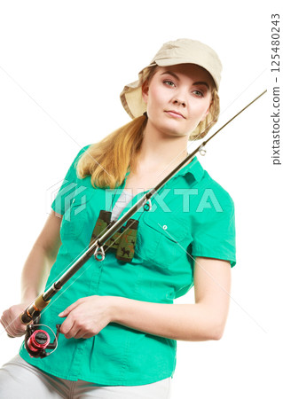 Woman with fishing rod, spinning equipment 125480243