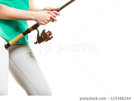 Woman with fishing rod, spinning equipment Woman with fishing rod, spinning equipment 125480244