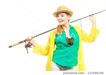 Woman with fishing rod, spinning equipment Woman with fishing rod, spinning equipment 125480246