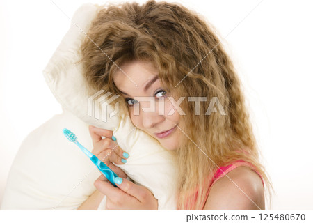 Happy cheerful woman wearing pajamas 125480670