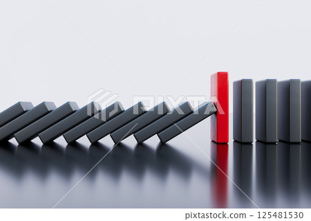 A strong domino stone that stops falling. Solution and strategy concept. A strong domino stone that stops falling. Solution and strategy concept. 125481530