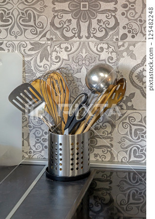 Kitchen utensil tools in metal pot Kitchen utensil tools in metal pot 125482248