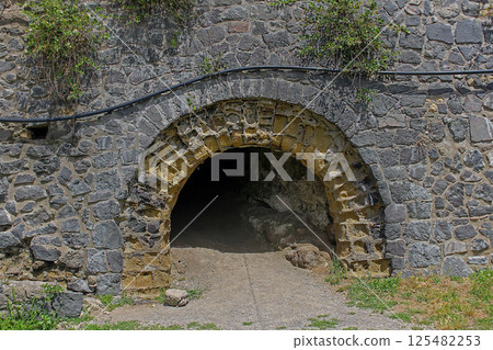 Oval cave entrance Oval cave entrance 125482253