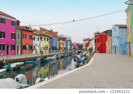 Burano canal street with colorful houses 125483222
