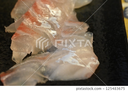 Fresh and delicious sea bream sashimi 125483675