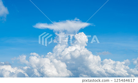 A majestic sea of clouds and cumulonimbus clouds floating in the blue sky A majestic sea of clouds and cumulonimbus clouds floating in the blue sky 125484617