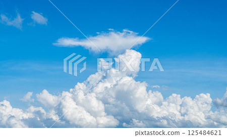 A majestic sea of clouds and cumulonimbus clouds floating in the blue sky 125484621