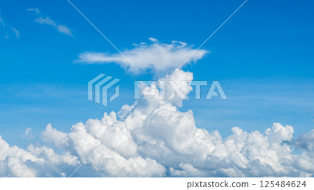 A majestic sea of clouds and cumulonimbus clouds floating in the blue sky 125484624