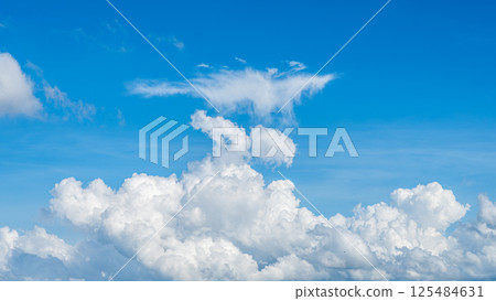 A majestic sea of clouds and cumulonimbus clouds floating in the blue sky 125484631