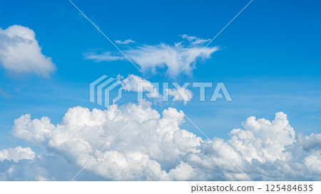 A majestic sea of clouds and cumulonimbus clouds floating in the blue sky A majestic sea of clouds and cumulonimbus clouds floating in the blue sky 125484635