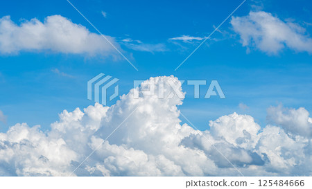 A majestic sea of clouds and cumulonimbus clouds floating in the blue sky A majestic sea of clouds and cumulonimbus clouds floating in the blue sky 125484666