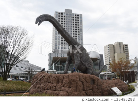 "Fukuititan" dinosaur sculpture in front of JR Fukui Station 125485298