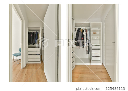 A sleek and organized interior closet featuring clothing and storage compartments. Subtle design elements enhance the modern aesthetic. 125486113