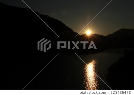 Sunset over the lake Sunset over the lake 125486478