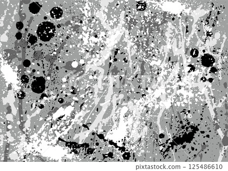 A background of white and black ink splashes on a grey base 125486610