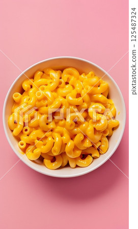 Breakfast mac and cheese pasta macaroni on white bowl story background 125487324